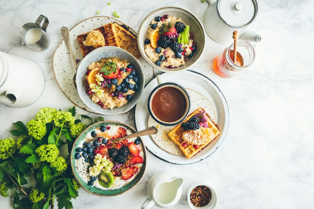 fruit salad on gray bowls by Brooke Lark on Unsplash